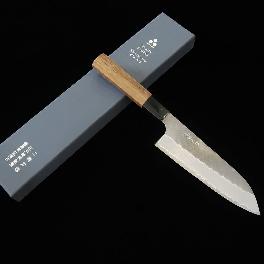 Nigara Cutelaria Aogami Super Kurouchi Santoku, cabo octogonal em teca (180mm)