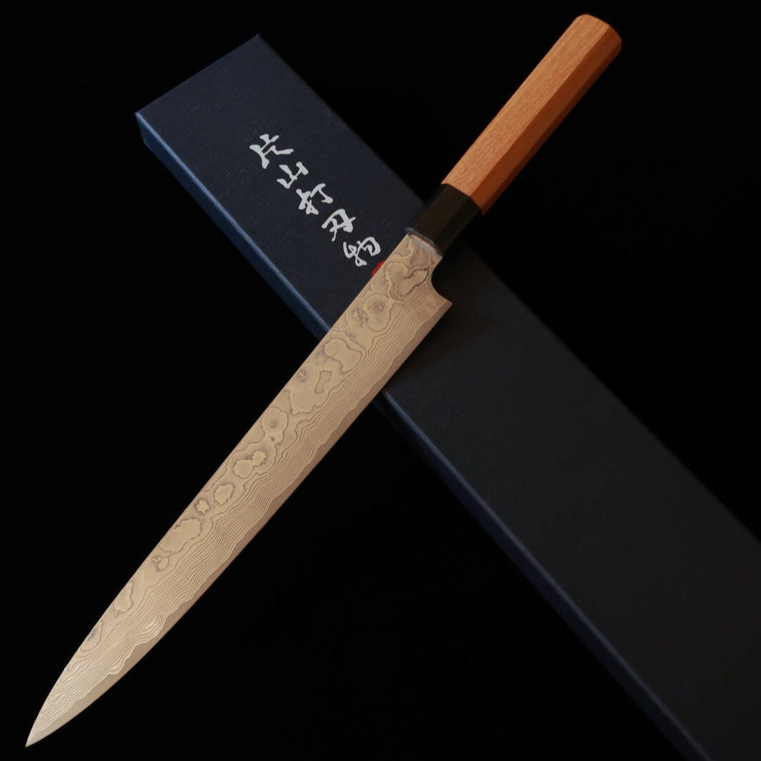 Sujihiki Yuta Katayama Inox VG10 Acabamento Níquel Damasco cabo Keyaki Octogonal (240/270mm)