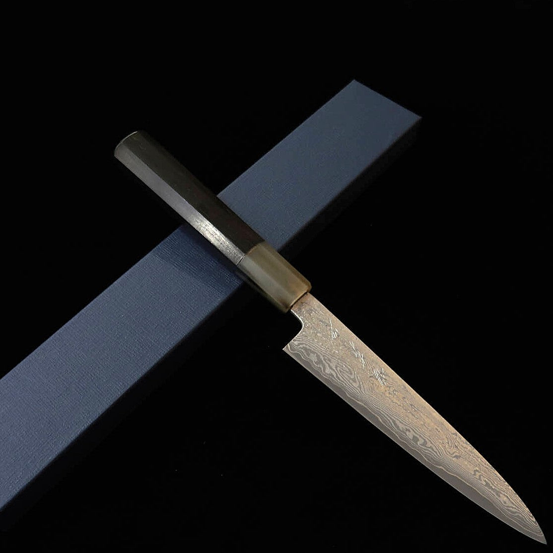 Sakai Kikumori serie Seiun, Petty VG10, mango de ébano y búfalo blanco (150 mm)