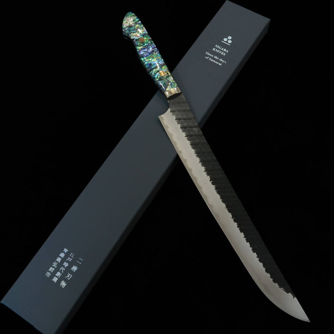 NIGARA Cuchillo sujihiki punta redondeada SG2 Kurouchi martillado Mango con incrustaciones de nácar (270/300 mm)