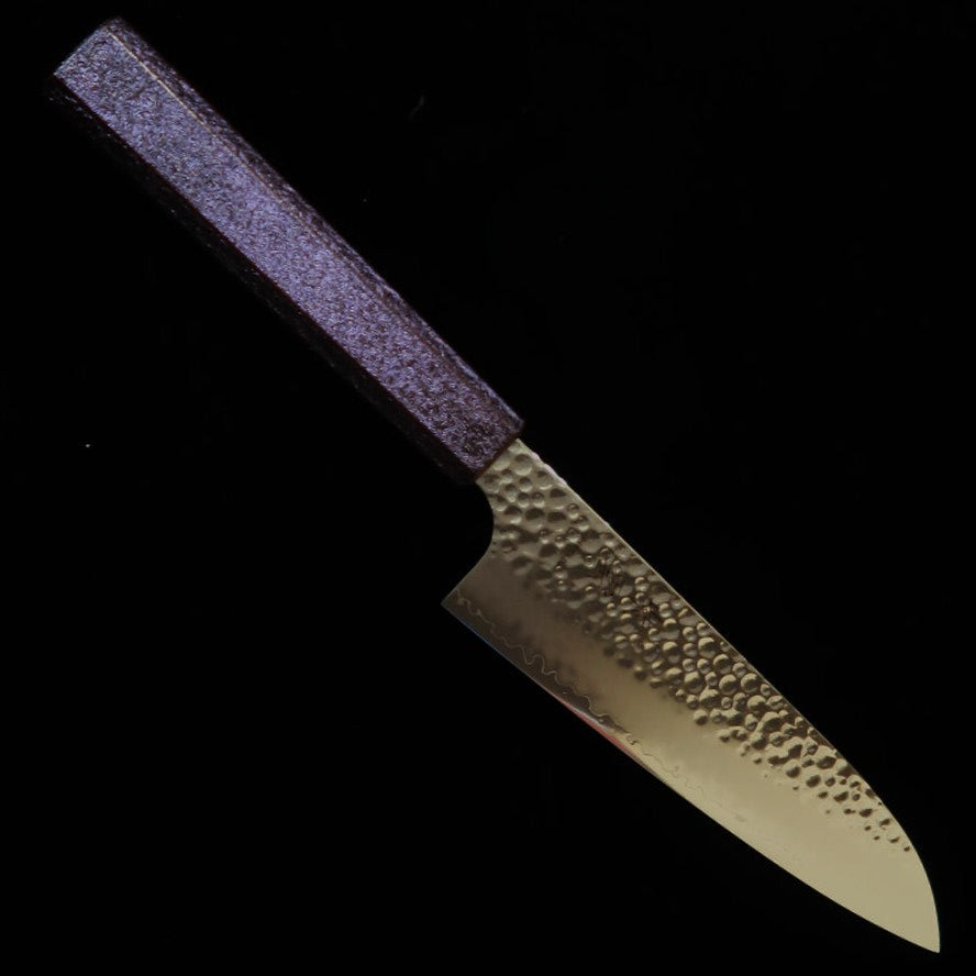 SEKIKANETSUGU Seki Kanetsugu “Shiun”, santoku VG10, martillado, mango octogonal de roble lacado “Monmurasaki” (púrpura) (170 mm)