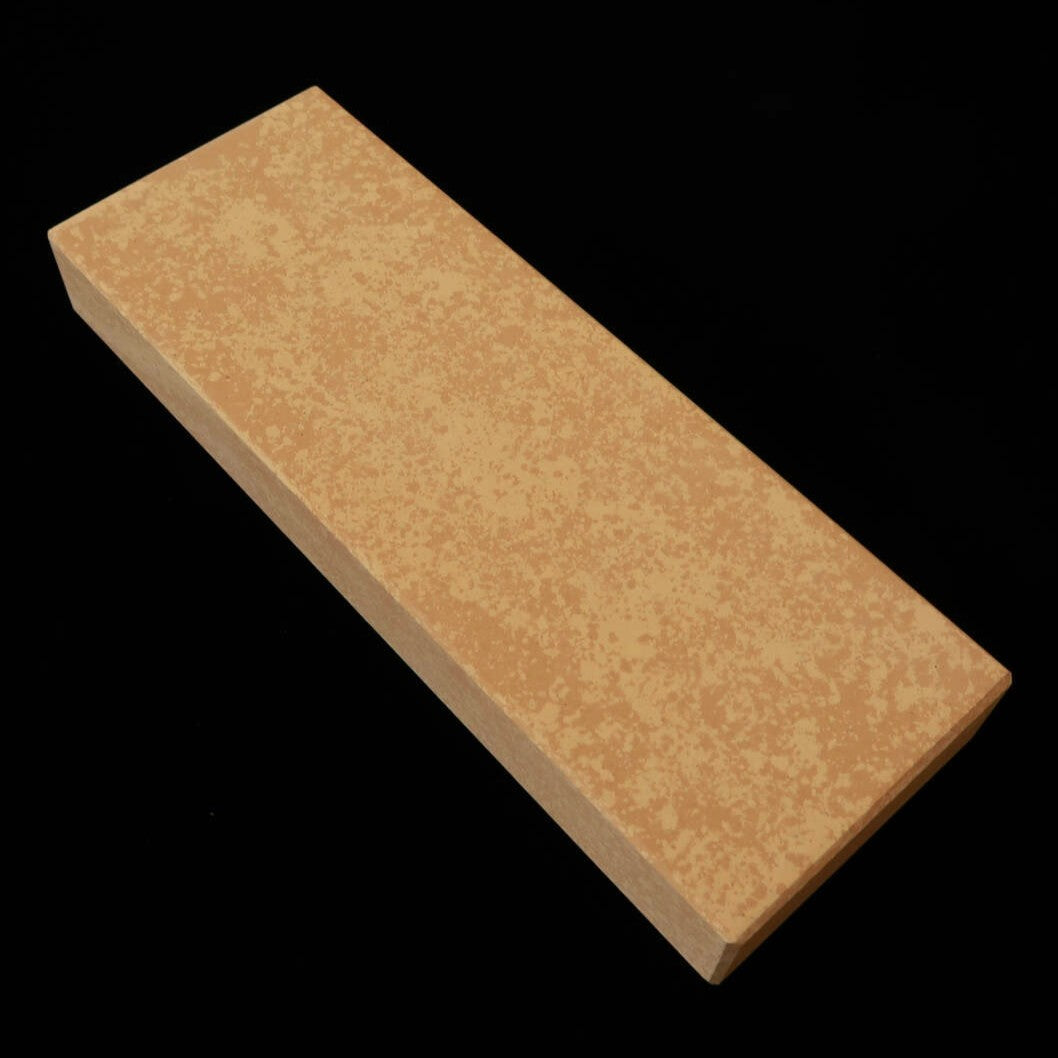 Piedra de acabado sintética tipo “Suita” con textura nacarada