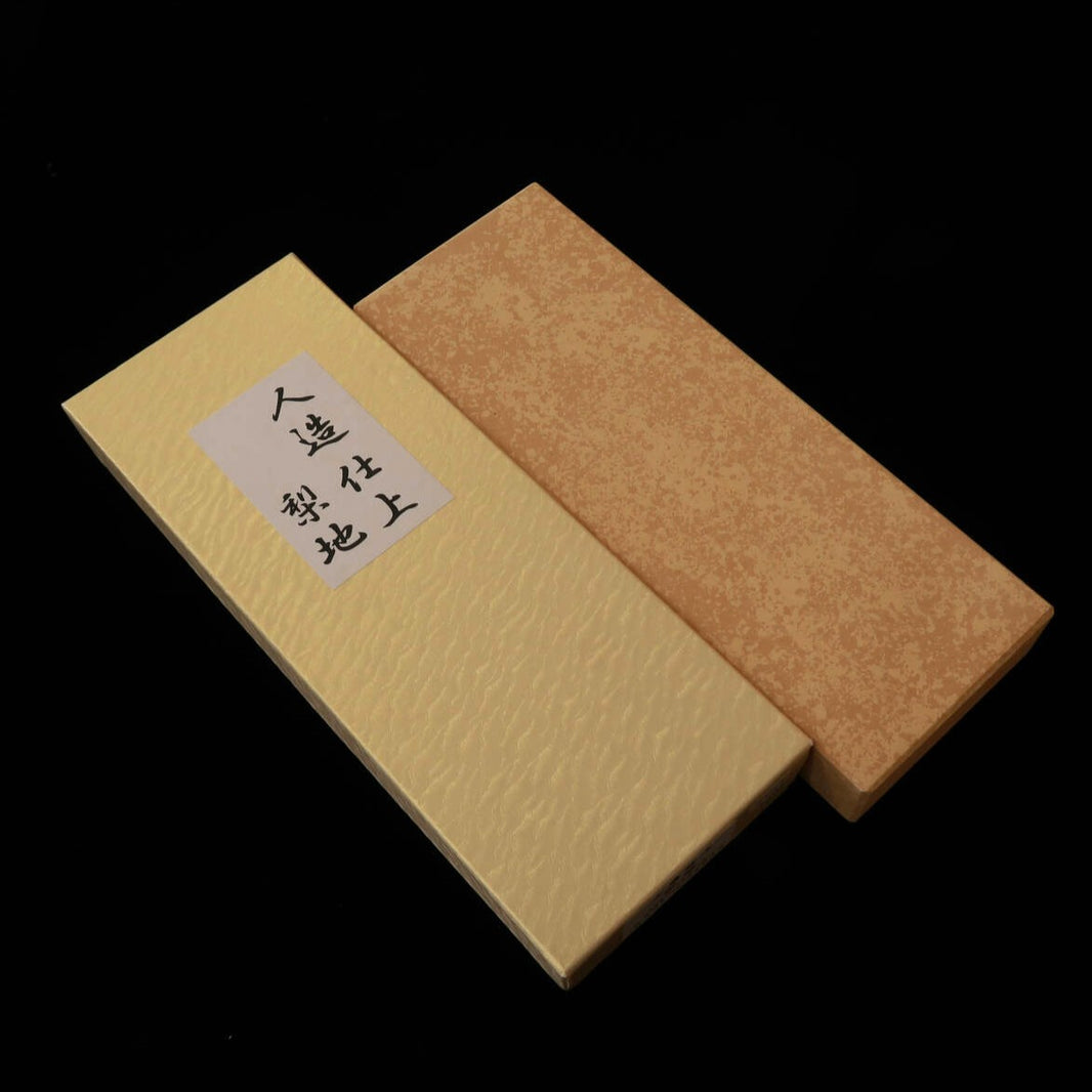 Piedra de acabado sintética tipo “Suita” con textura nacarada
