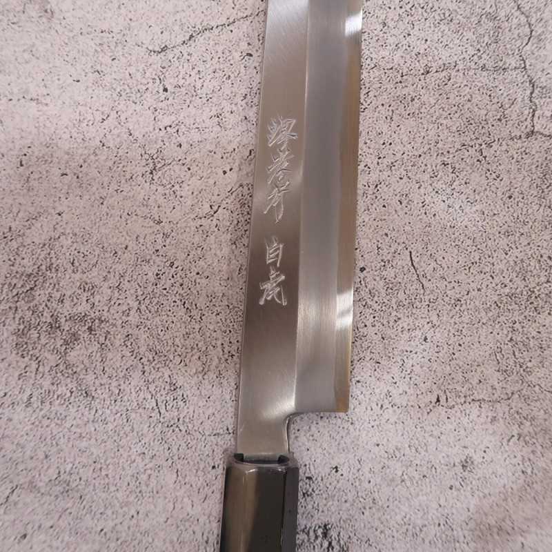 Sakai Takayuki SAKAI TAKAYUKI Byakko Shirogami nº1 Kiritsuke Yanagiba Mango octogonal de ébano (270/300 mm)